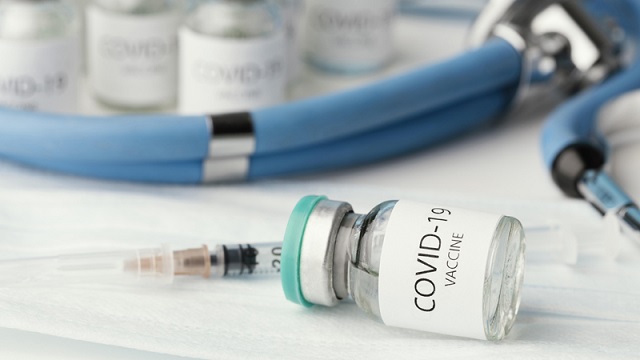 assortment-with-coronavirus-vaccine-bottle